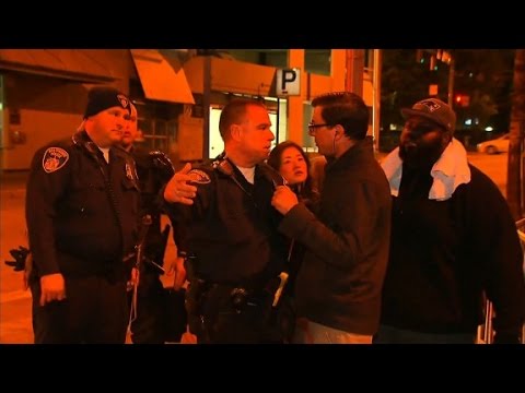 Baltimore police officer confronts CNN reporter