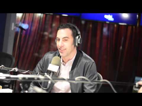 Sacha Baron Cohen Gives Trump AIDS - @OpieRadio