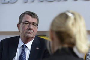 Secretary of Defense Ash Carter speaks to members of the traveling press corps at U.S. Pacific Command Headquarters at Camp Smith in Hawaii April 12, 2015. Carter is on a visit to the U.S. Pacific Command Area of Responsibility to make observations for the force of the future and the rebalance to the Pacific. DoD photo by Petty Officer 2nd Class Sean Hurt/Released.