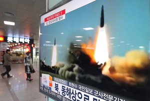 A TV screen shows a file footage of the missile launch conducted by North Korea, at Seoul Railway Station in Seoul, South Korea, Thursday, March 10, 2016.