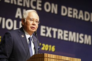 File - In this Jan. 25, 2016, photo, Malaysian Prime Minister Najib Razak speaks at a conference in Kuala Lumpur, Malaysia.