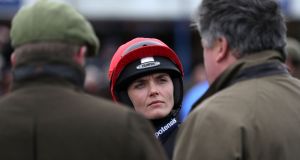 Victoria Pendleton (centre) talks to trainer Paul Nicholls (right) prior to the Betfair Switching Saddles Hunter Chase at Wincanton Racecourse. The former Olympic cycling champion won the race aboard Nicholls’s horse   Pacha Du Polder, her first win under national Hunt Rules. Photograph:  David Davies/PA Wire