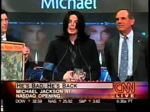 Michael Jackson rings NASDAQ bell and eats birthday cake