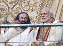 PM Narendra Modi with Art of Living founder Sri Sri Ravi Shankar at the opening session of the three-day World Culture Festival on the banks of the Yamuna in Delhi on Friday.