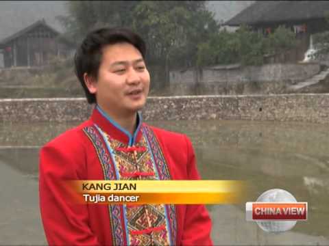 Tujia people celebrate Lunar New Year with hand-waving dance