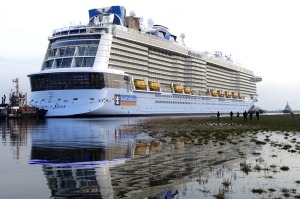 Caribbean's Ovation of the Seas begins its conveyance down the River Ems out to the North Sea. Royal Caribbean media images