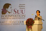 Nobel Peace Prize laureate Daw Aung San Suu Kyi addresses the participants of the East-West Center International Media Conference at a special pre-conference luncheon and announced the launch of the Suu Foundation, a humanitarian organization dedicated to advancing the health and education of the people of Myanmar (Burma), March 9, 2014.