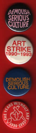 badges promoting the Art Strike