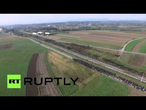 World News Today 2015 Drone buzzes refugee march in Slovenia