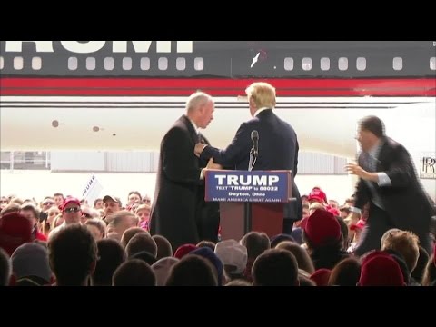 VIDEO: Trump Swarmed by Security When Protester Jumps on Stage, Trump Blames ISIS