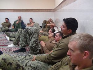 Image released by Iran’s Revolutionary Guards shows US sailors briefly detained when their boat broke down in Iranian waters. Iranian state media has confirmed their release, 12 January, 2016.