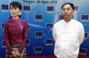 FILE - In this April 28, 2012, file photo, Myanmar pro-democracy leader Aung San Suu Kyi, left, and Myint Swe, right, ...