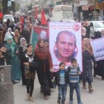 Palestinian women march in Gaza refugee camp to demand justice for Comrade Omar Nayef Zayed