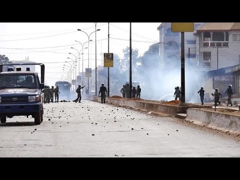 Anti-government protesters in Guinea clash with police