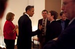 Barack Obama and  Mark Zuckerberg