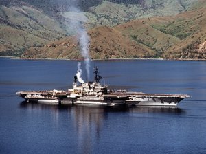 The U.S. Navy aircraft carrier USS Midway (CV-41) entering Subic Bay, Philippines. Midway, with assigned Carrier Air Wing 5 (CVW-5), was deployed to the Western Pacific from 14 September to 11 December 1982.