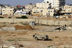 Egyptian army armored vehicle stands on the on the Egyptian side of border town of Rafah, north Sinai, Egypt