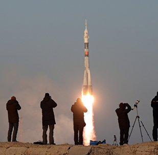 The launch of a Soyuz-FG rocket with the Soyuz TMA-19M manned spacecraft from the Baikonur Space Center