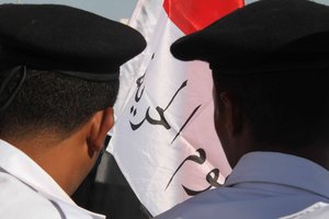 An Egyptian anti-Mubarak protester holds a noose during a protest outside the police academy in Cairo, Egypt, Wednesday, Aug.3, 2011