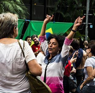 People demonstrate in support of Brazil's President Dilma Rousseff's appointment of Brazil's former President Luiz Inacio Lula da Silva as her chief of staff, at Paulista avenue in Sao Paulo, Brazil