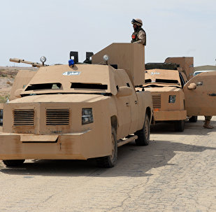 The Desert Falcons self-defense unit re-deploy outside Palmyra, Syria.