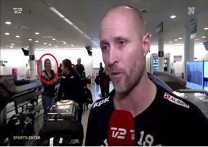 In the background of an airport interview for Sports Center on Norwegian TV (or may be Danish TV) a woman is there one second and not the next.