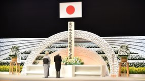 Japanese Emperor Akihito and Empress Michiko attend a ceremony in Tokyo to remember the victims 11 March 2011 earthquake and tsunami