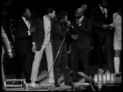 James Brown takes control as fans rush the stage. Live at the Boston Garden. April 5, 1968.