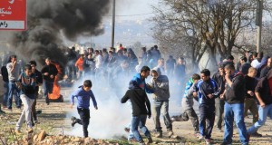 Demonstration attacked with tear gas shot by Israeli forces.