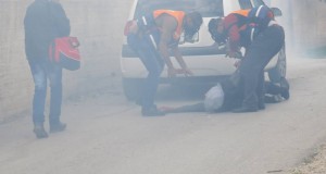 Protester suffocated after inhaling tear gas.