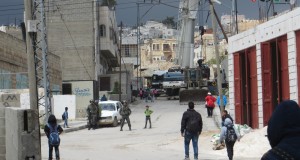 Israeli forces stopping school-boys on their way home, denying them passage