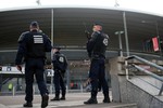 French riot police officers stand guard outside the Stade de France prior to the Six Nations rugby match between France and Italy, in Saint Denis, north of Paris, Saturday, Feb. 6, 2016.