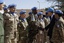 Secretary-General Ban Ki-moon (second from right) greets peacekeepers during a military ceremony at the United Nations Mission for the Referendum in Western Sahara (MINURSO) Bir Lahlou site, 5 March, 2016.