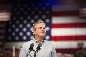 Former Florida Gov. Jeb Bush takes the stage as he formally joins the race for president with a speech at Miami Dade College, Monday, June 15, 2015, in Miami. (AP Photo/David Goldman)