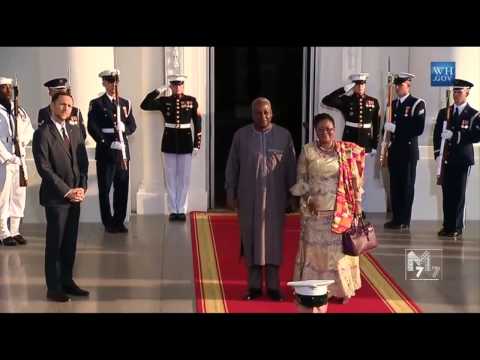 Ghana President John Dramani Mahama and spouse Lordina Mahama arrive at the White House Diner