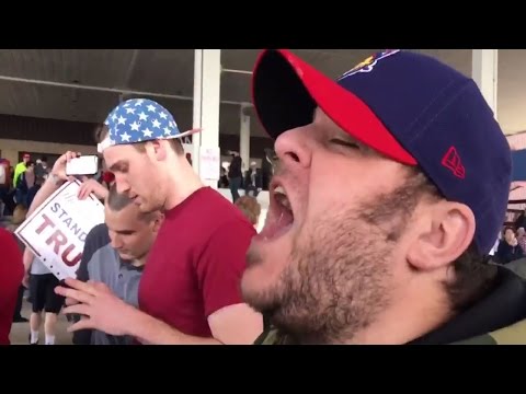 Donald Trump Supporter Screams "Go Back To Africa" At Black Protester