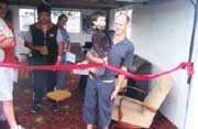 About to cut the ribbon at the
official opening of the new WSPNZ Headquarters at Manurewa, 2002.
Click to see a larger view.