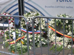 Entrance of Maelbeek/Maalbeek metro station at Rue de la Loi/Wetstraat: Flowers and inscriptions after March 2016 Brussels attacks (Belgium), rue de la Loi.