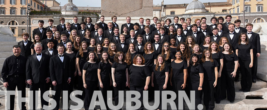 The Auburn University Symphonic Band is gathered together in Italy before performing.