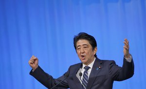 Japanese Prime Minister Shinzo Abe makes a speech during the Liberal Democratic Party's annual convention at a hotel in Tokyo, Sunday, March 13, 2016.