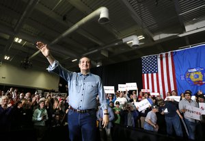 Republican presidential candidate, Sen. Ted Cruz-R-Texas, waves to the crowd during a campaign stop Monday, March 28, 2016, in Rothschild, Wisc.