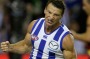 Evergreen: The Roos' Brent Harvey celebrates a goal during the round one match against Adelaide.