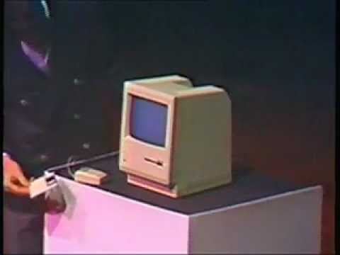 Steve Jobs presenting the first Mac in 1984