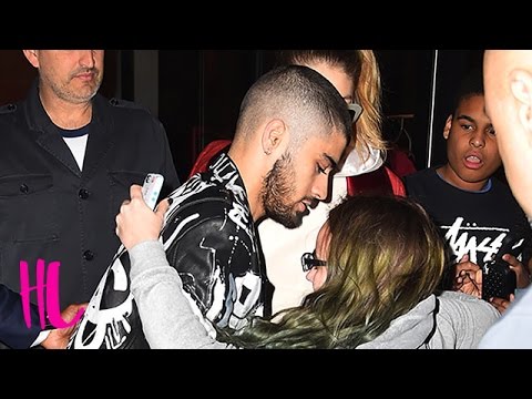 Zayn Malik & Gigi Hadid Rescue Fan Pushed By Paparazzi - VIDEO