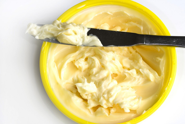 6. Margarine. It's high in trans fats; and these are formed through the process of hydrogenation, which turns liquid vegetable oils to solid. Trans fats clog the arteries which has a disastrous effect on cardiovascular health.