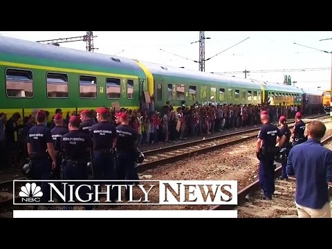 Thousands of Migrants Still Streaming Into Hungary Despite Maltreatment | NBC Nightly News