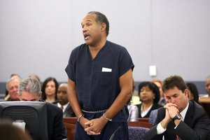 File - O.J. Simpson speaks during his sentencing hearing at the Clark County Regional Justice Center in Las Vegas, Friday, Dec. 5, 2008.