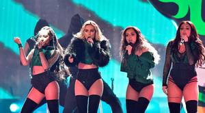 Jesy Nelson (far right) promised on Instagram that Little Mix would dedicate a song at their Belfast show.