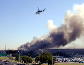 A US Park Police helicopter flying above the burning Pentagon.