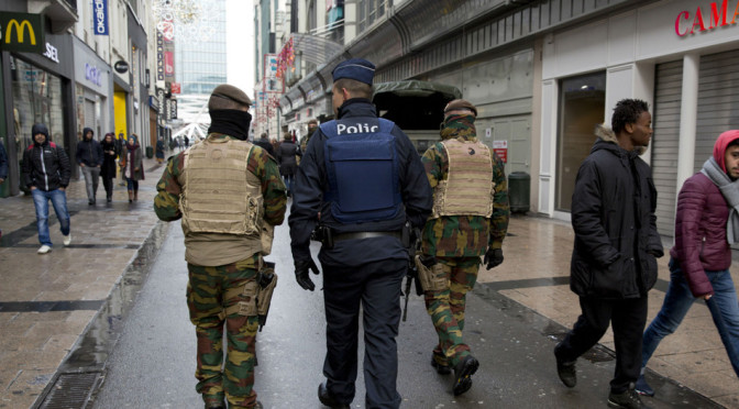 Belgian soldiers and police patrol Molenbeek